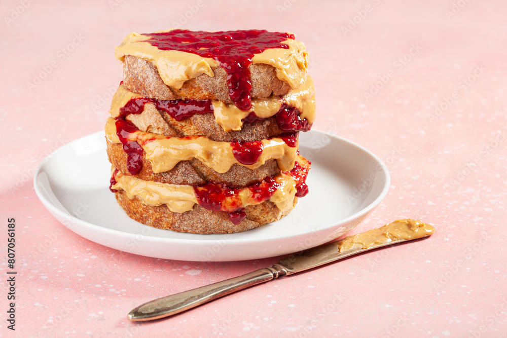 smooth peanut butter and jam bread toast, american traditional sandwich smooth peanut butter and jam bread toast, american traditional sandwich