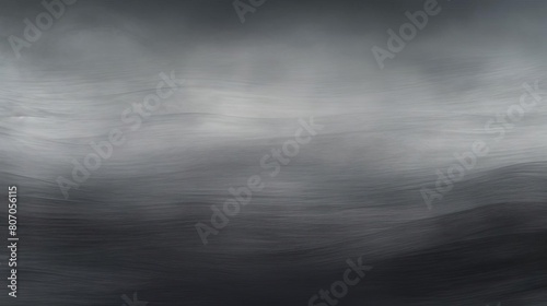 Foggy landscape with a dark, cloudy sky. photo