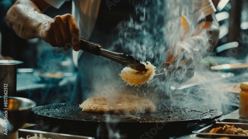 A chef flipping a crispy roti on a hot griddle, golden brown and fragrant, showcasing the skill and artistry of Thai street food cooking.