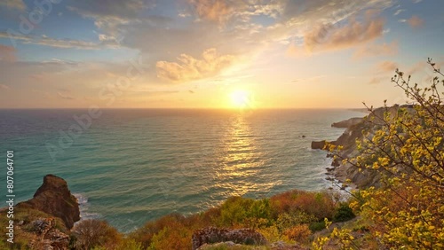 Sunset on cliffs. Beautiful spring nature and sea landscape. Relax composition.