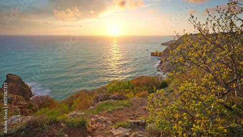 Sunset on cliffs. Beautiful spring nature and sea landscape. Relax composition.