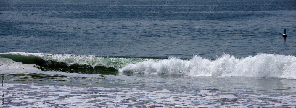 Pacific ocean surf waves at a beach in California
