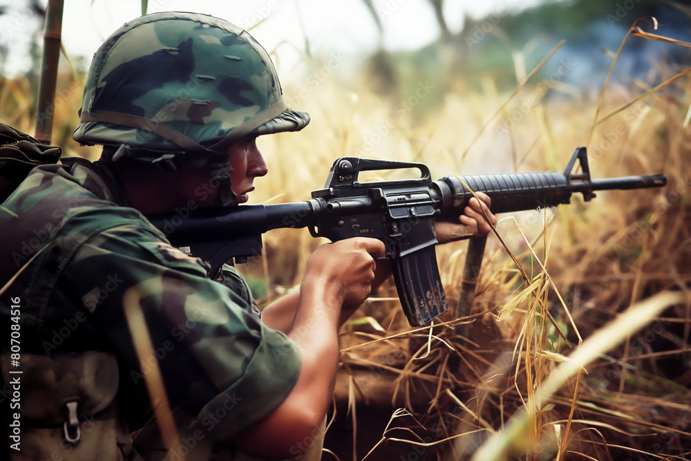 US Military Soldier Shooting Assault Rifle M16 In Vietnam War Stock US Military Soldier Shooting Assault Rifle M16 In Vietnam War Stock