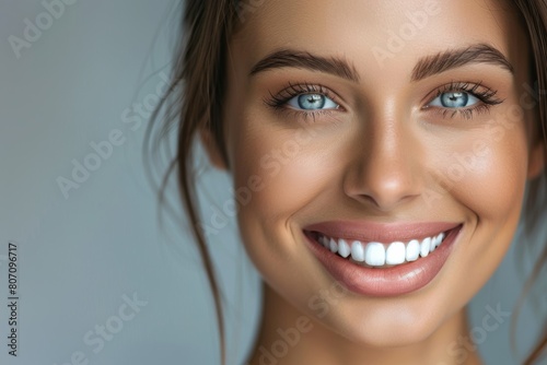 Smiling woman showcasing her newly enhanced lips after receiving Botox injections  exuding satisfaction and beauty.