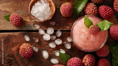 Lychee juice on wooden table photo