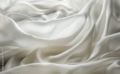 Elegantly curved paper forms arranged to mimic smooth, flowing waves.