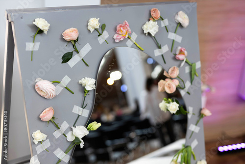 spring decor of flowers on a large mirror