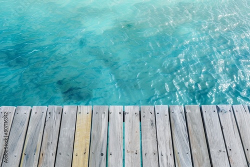 Serene Ocean View from Wooden Dock: Tranquil Waters and Coastal Beauty © Flow_control