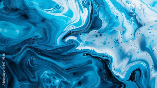 Abstract art with a blue paint background, exhibiting a liquid fluid grunge texture. photo