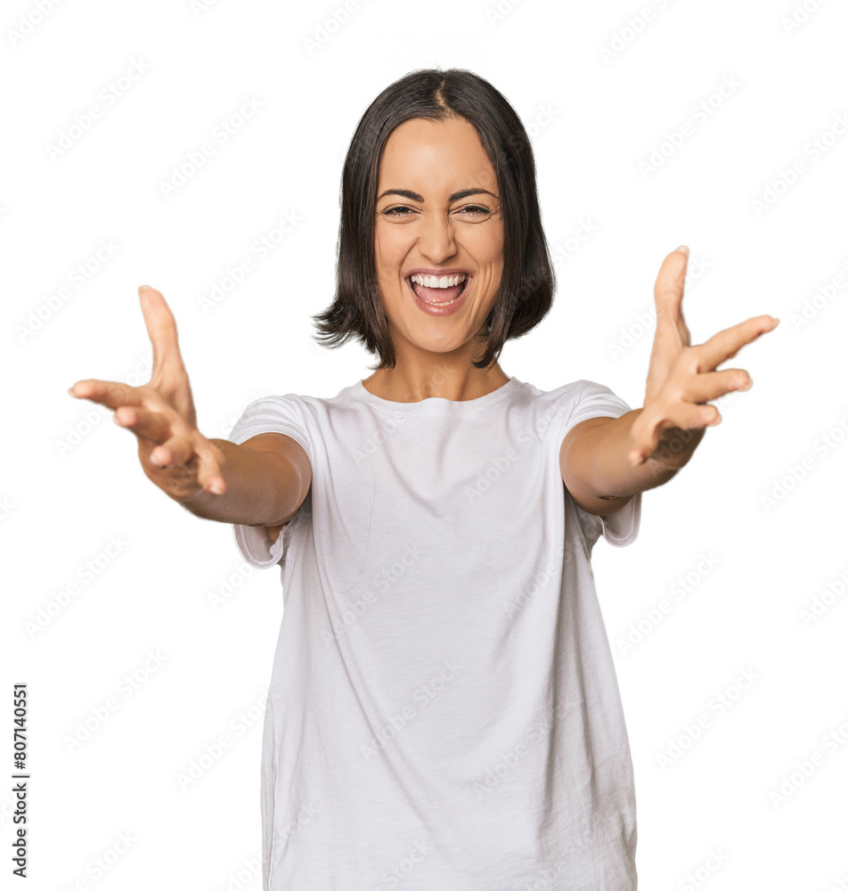 Young Caucasian woman with short hair feels confident giving a hug to the camera. Young Caucasian woman with short hair feels confident giving a hug to the camera.