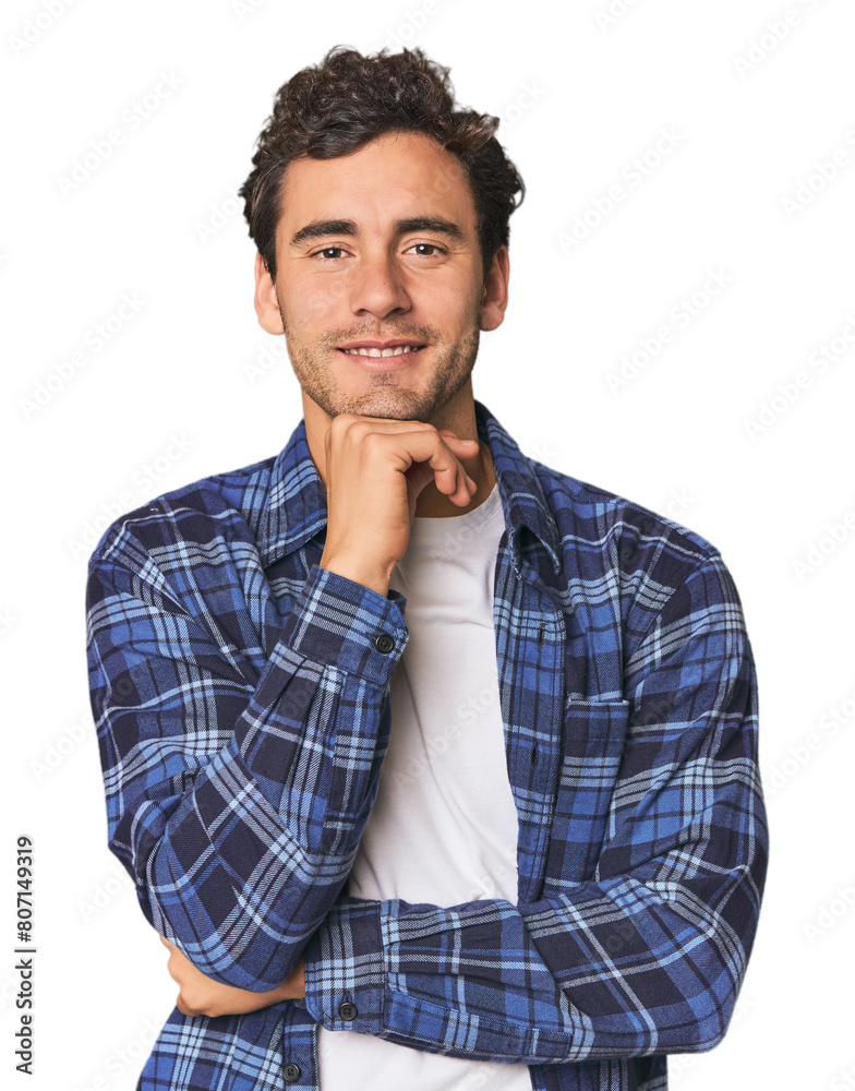Young Hispanic man in studio smiling happy and confident, touching chin with hand. Young Hispanic man in studio smiling happy and confident, touching chin with hand.