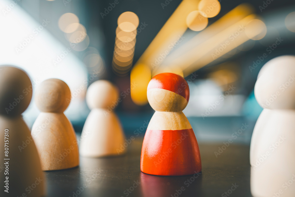 The red model is separated from the group of other models. The concept of workplace bullying, socializing, cooperation at work is a problem. The red model is separated from the group of other models. The concept of workplace bullying, socializing, cooperation at work is a problem.