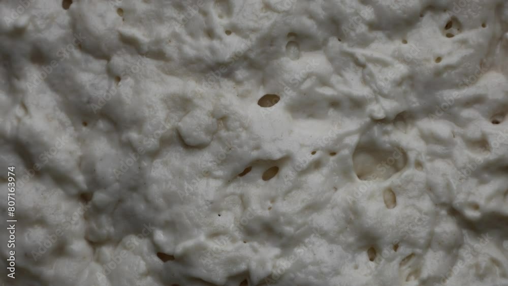 zooming into fully fermented bubbly dough (sourdough bread prep) baking, food, gourmet, rustic loaf (zoom, close up, getting closer) from above looking down macro zooming into fully fermented bubbly dough (sourdough bread prep) baking, food, gourmet, rustic loaf (zoom, close up, getting closer) from above looking down macro