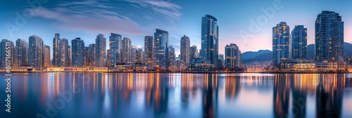 Panoramic shot of a bustling city skyline reflecting on the calm waters during the blue hour, with lights aglow