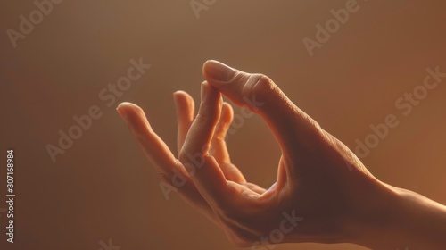 Yogic hand gesture Shuni mudra. Isolated on a toned background. photo