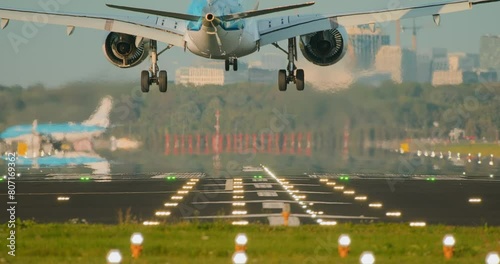 Landing: Passenger Aircraft Touches Down on Runway