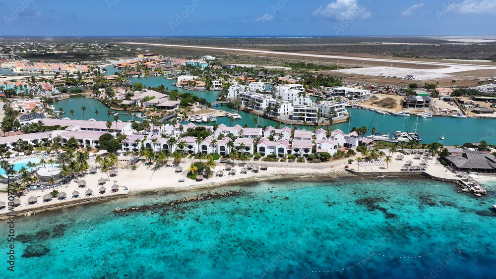 Fototapeta premium Caribbean Houses At Kralendijk In Bonaire Netherlands Antilles. Caribbean Island. Downtown Skyline. Kralendijk At Bonaire Netherlands Antilles. Caribbean Beach Landmark. Colored Buildings.
