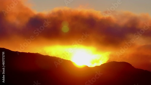 Sunset clouds in Los Machucos at 921 meters above sea level and communicates the villages of Bustablado and San Roque de Riomiera. Pasiegos Valleys, Cantabria, Spain, Europe photo