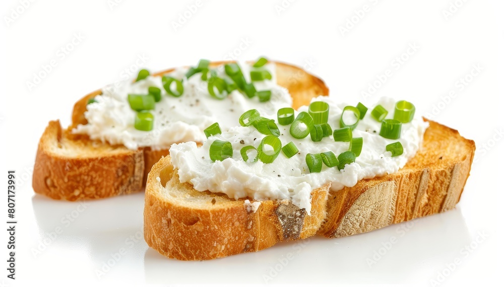 Toasted bread with cream cheese and green onions on a white background Toasted bread with cream cheese and green onions on a white background