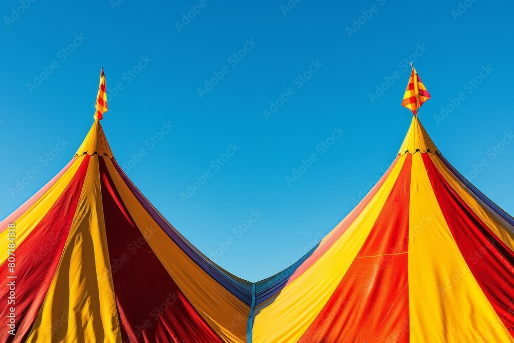 Two circus tents in yellow and red Two circus tents in yellow and red