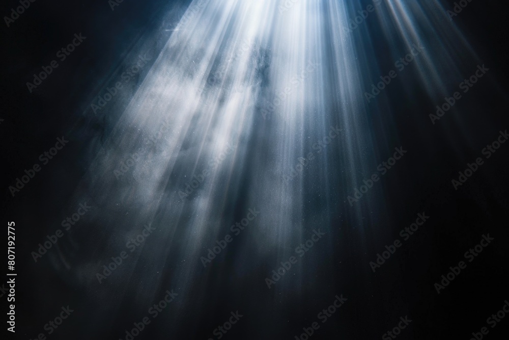 Sun rays isolated on black background for design overlay.