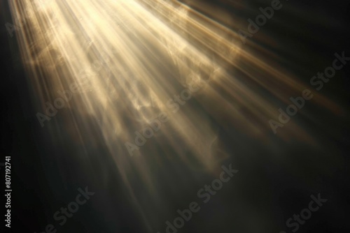 Sun rays isolated on black background for design overlay. © darshika