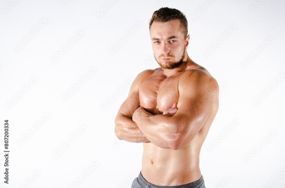 Handsome man with an athletic body. Fitness and healthy lifestyle. Handsome man with an athletic body. Fitness and healthy lifestyle.