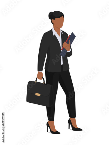 Confident businesswoman holding a briefcase and paperwork