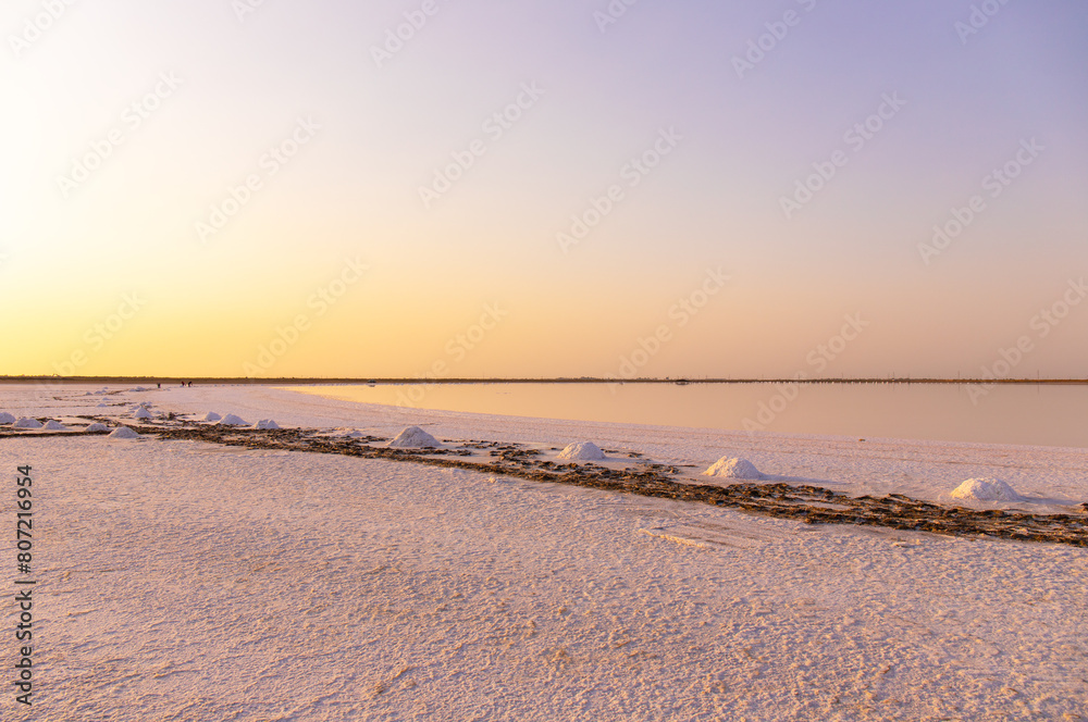 People collect salt by putting it in bags. Neftchala. Azerbaijan. People collect salt by putting it in bags. Neftchala. Azerbaijan.
