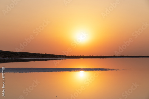Reflection of the sun in a salt lake.