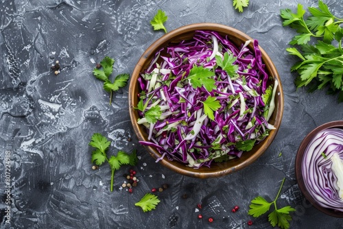 Lime cilantro coleslaw with red and white cabbage on grey stone