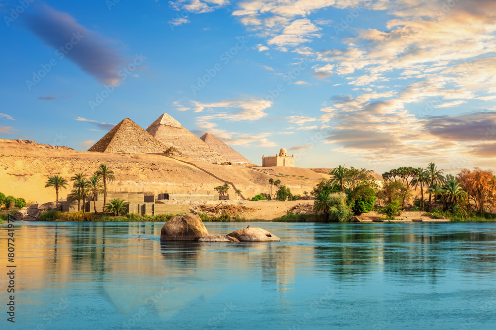 Ancient rocks in the Nile on the way to pyramids, Aswan, Egypt