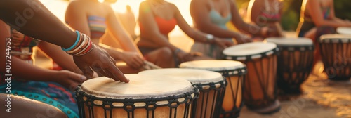 A vibrant drum circle with individuals playing traditional African drums, evoking a sense of unity and cultural celebration