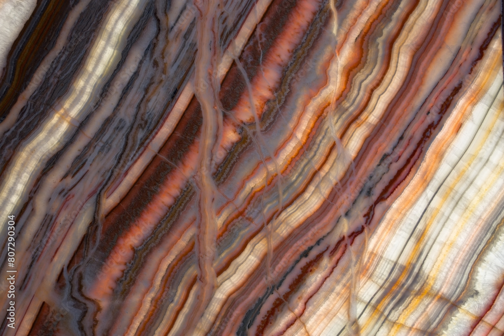 Close up of backlit onyx texture. High resolution photo.Nice background for design projects. Onyx Rainbow