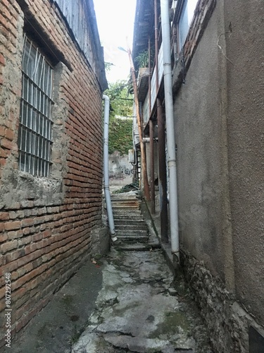 Narrow passage between houses