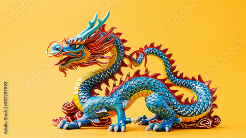 Blue and Red Dragon Statue on Yellow Background