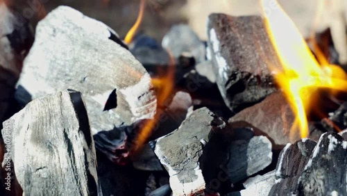 Ephemeral Embers: A Mesmerizing Close-Up of a Pile of Coal