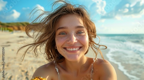 Beautiful Young Woman Standing on Top of a Beach