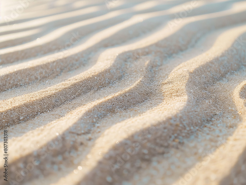 Close-up photo of natural sand patterns on a beach reveals serene beauty with soft  wave-like textures  evoking a simple  calming aesthetic.
