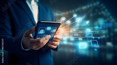 Businessman on blurred background using digital tablet with holograms datas 3D rendering