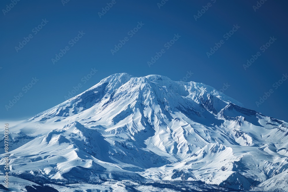 Landscape of on a Clear Day Showing Majestic Volcano, Snow and Blue Sky