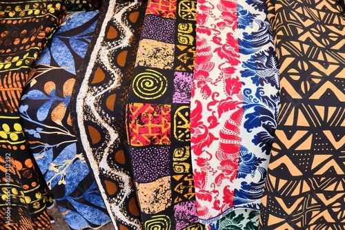 Close up view of African Ghanaian traditional multi colour and multi pattern cotton print cloths