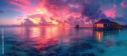 luxury resort on sea at pink sunset