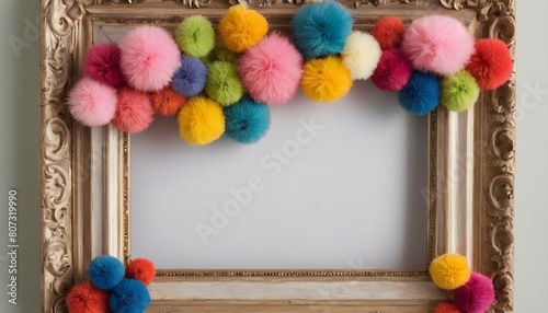 A whimsical frame adorned with colorful pom poms
