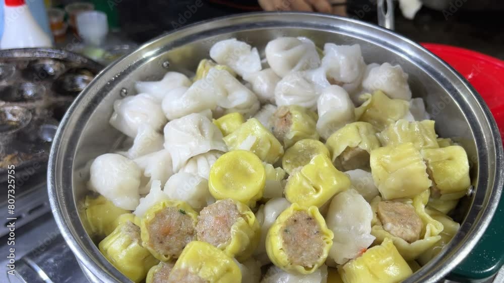 Barbequing squid, Street Food, Asian countries Vietnam Barbequing squid, Street Food, Asian countries Vietnam