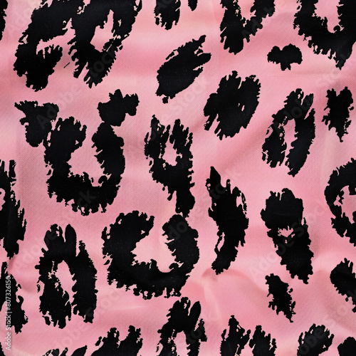 Fabric texture. Black leopard spots on a pink background. Seamless. © Got Pink?