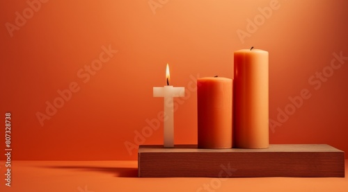 religious candles on wooden surface