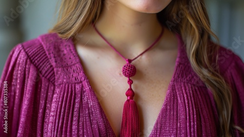 Woman Wearing Red Necklace With Tassel