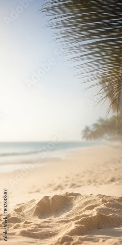 Sand with blurred Palm and tropical beach bokeh background Summer vacation and travel concept