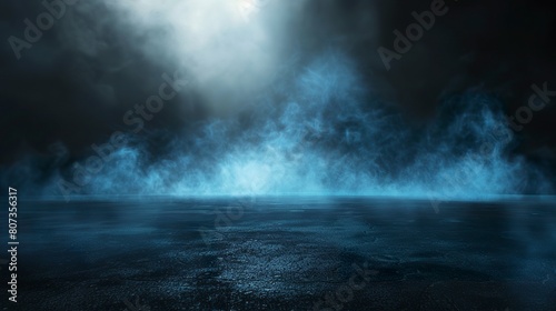 An abstract night background with smoke on the asphalt floor under soft blue light. Dark scene of an empty space for product presentation.